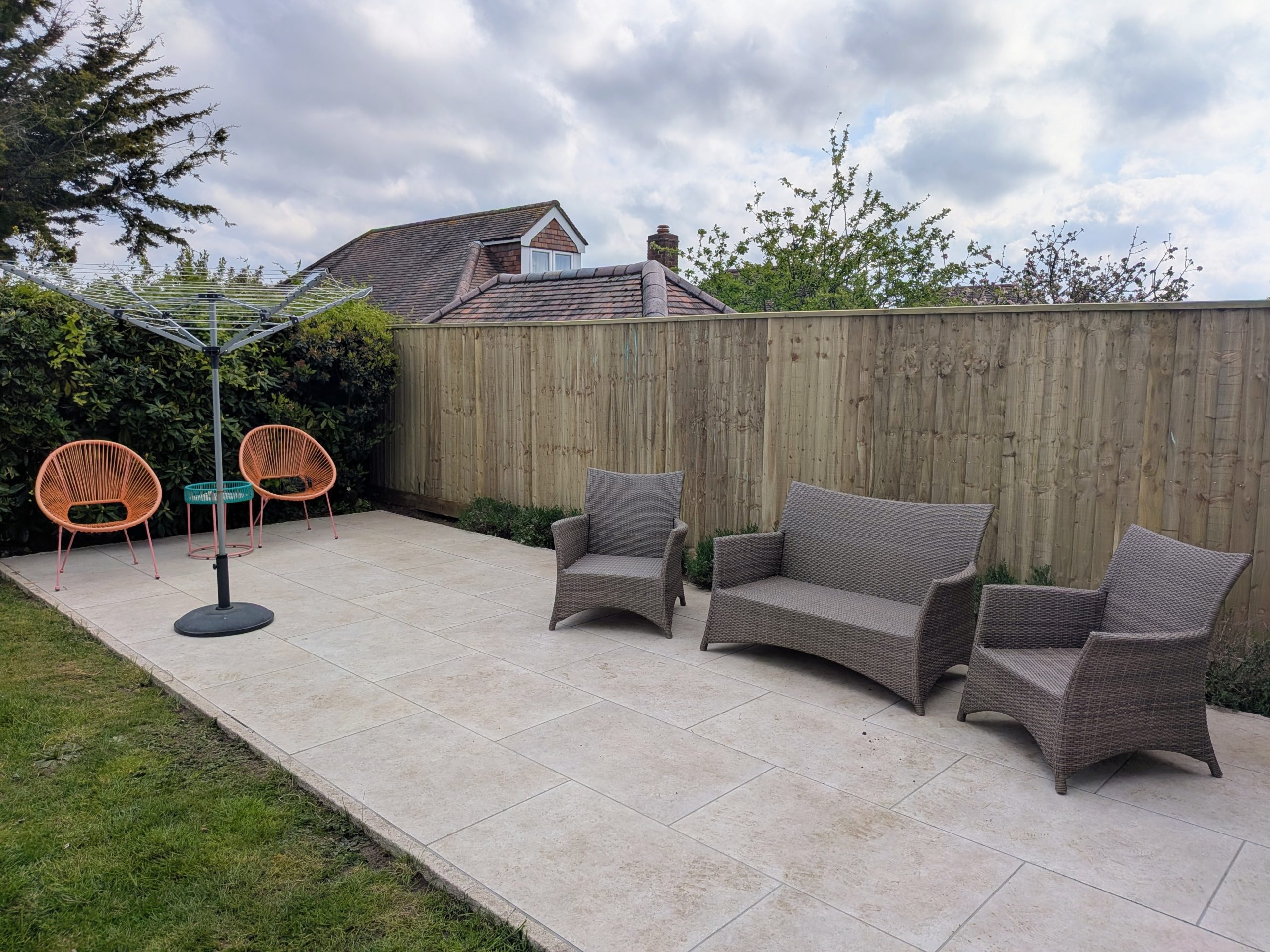 New 14 metre closeboard fence installation with timber gravel boards in Queens Park